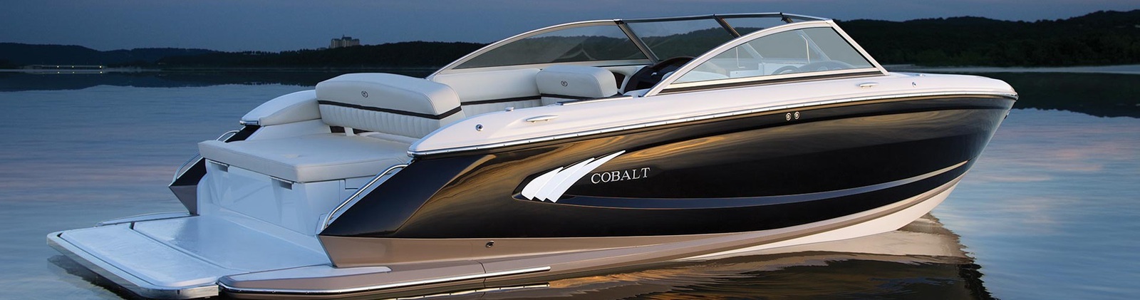 Cobalt boat on a body of water.